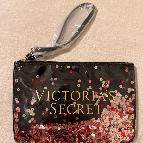 Victoria's Secret Handbags - Victoria's Secret Black Clutch with Red Sequins